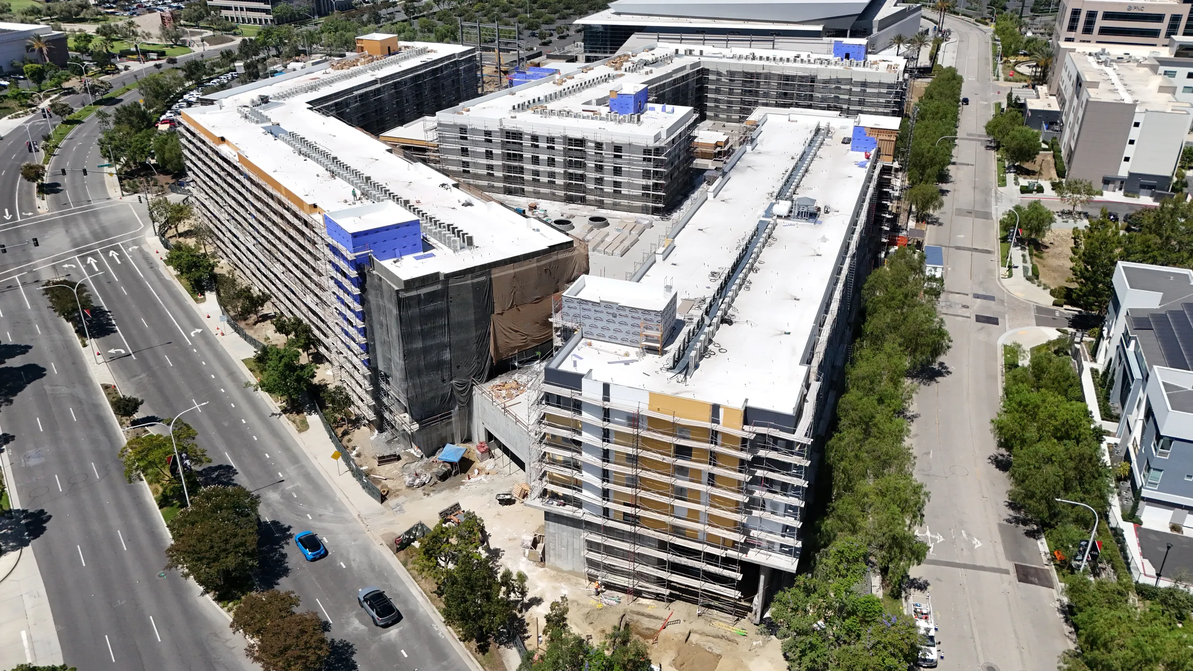 Drone photograph of the Phase One buildings under construction beside the boulevard
